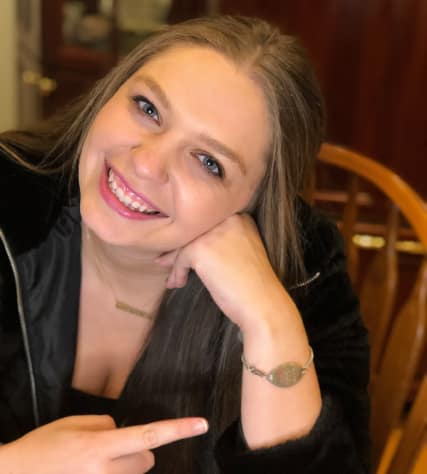 Photo of Sarah wearing her MedicAlert bracelet.